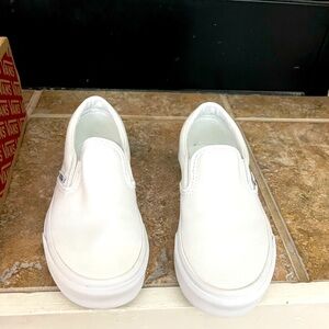 Brand new Vans. Never wore. Size 5.5 white